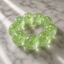 Load image into Gallery viewer, orange Feelzies™ Original Squishy Bracelet: Sunburst Orange fidget
