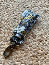 Load image into Gallery viewer, Rifle Paper Co. Dark Gray Metallic Floral Lip Balm Holder

