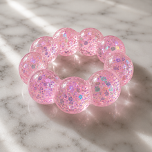 Load image into Gallery viewer, orange Feelzies™ Original Squishy Bracelet: Sunburst Orange fidget
