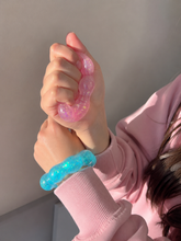 Load image into Gallery viewer, orange Feelzies™ Original Squishy Bracelet: Sunburst Orange fidget
