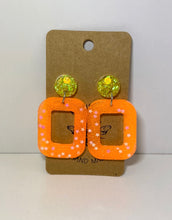 Load image into Gallery viewer, Neons yellow and orange star squoval stud dangles- black light reactive
