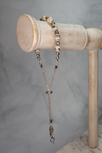 Load image into Gallery viewer, Sheet Music Slider Knot Paper Bead Bracelet w/ silver glass spacer beads &amp; silver music note charm
